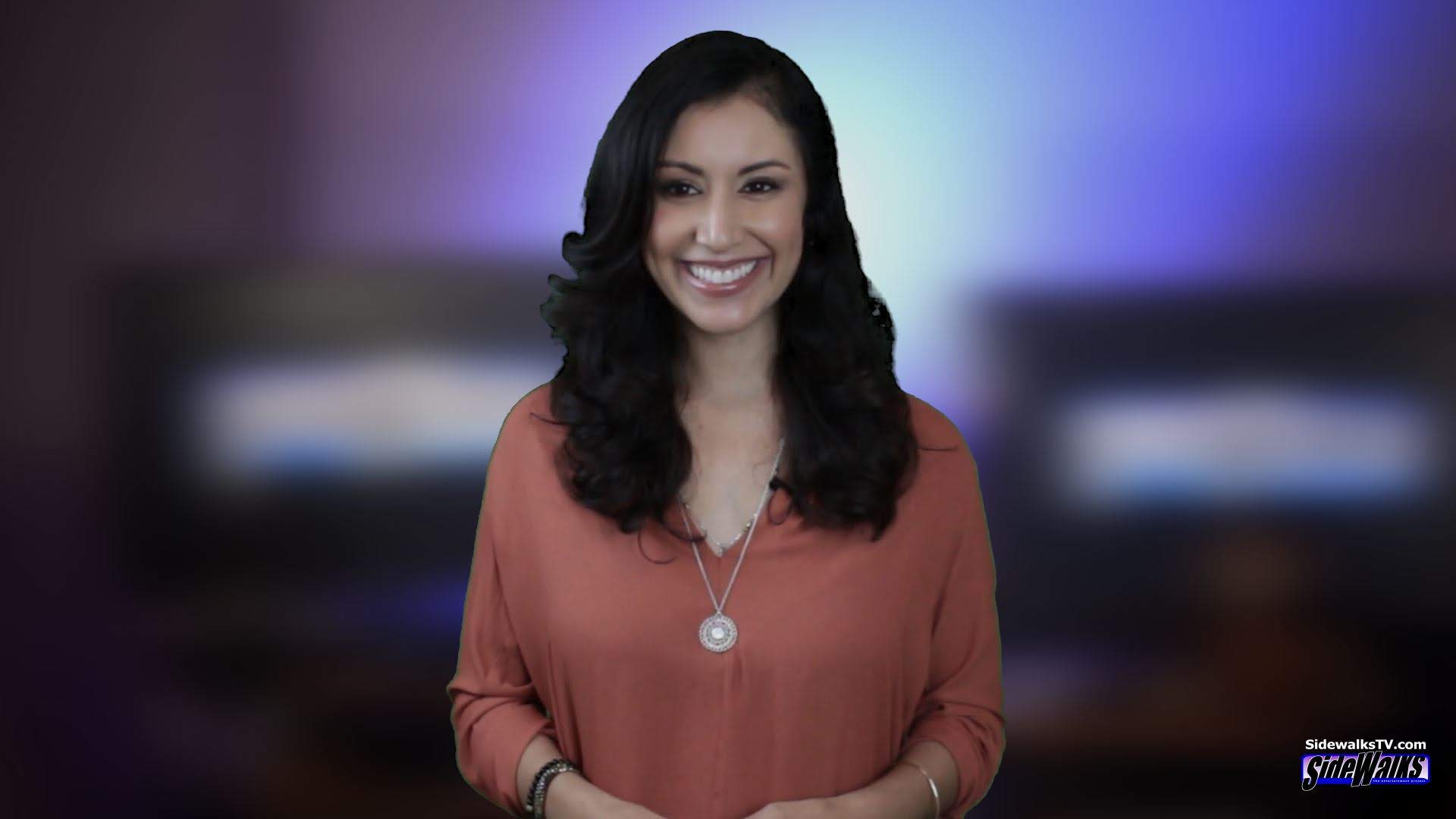 Host Veronica Castro standing on set